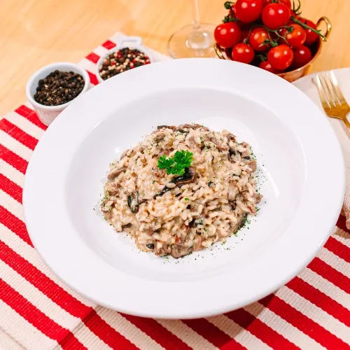 Risoto de filé com cogumelos